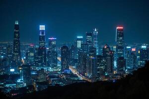 Skyline of a city at night with many skyscrapers photo