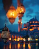 A group of lanterns hanging from a bridge in front of a mosque photo