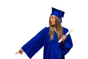 Graduated student pointing finger with graduation gown and diploma on white background photo