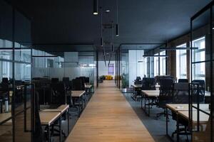 Modern business, glass-walled startup office, open and spacious workspace exudes a modern and innovative vibe, fostering a dynamic atmosphere that supports creativity, collaboration, and business photo