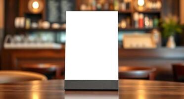 A blank white box on a table in front of a bar photo