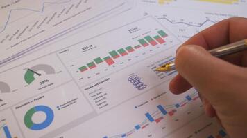 An insightful and detailed analysis of data trends and business metrics with the aid of charts and graphs photo