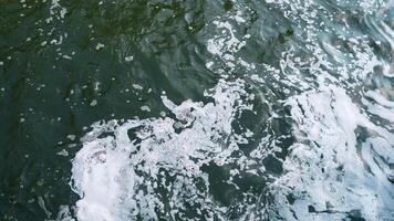 Water background with foam abstract photo