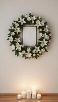 Funeral wreath with an empty center for text or photo, hanging on a plain wall with white candles burning below, creating a solemn atmosphere.7 photo