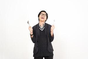 A man holding two forks and a spoon photo