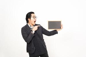 A man holding a blackboard and pointing at it photo