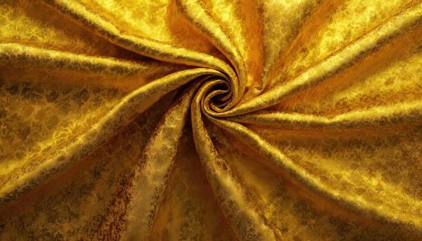 Golden silk fabric with a swirl pattern photo