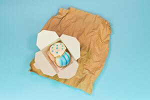 Local bakery displaying fresh Easter sweets and figolli biscuits. Local bakery fosters warm sense of community. Bakery fueling sweet gatherings with comforting dough aroma photo