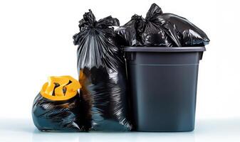 Garbage can with black garbage bags and yellow trash can photo