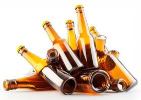 A pile of empty beer bottles on a white background photo