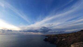 Timelapse fluffy Cumulus clouds moving in sky over calm sea. Abstract aerial view nature summer ocean, sea and sky view. Weather and Climate Change. Travel, holiday and vacation concept. video
