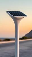 a solar powered street light on a road photo