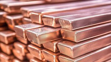 a pile of copper bars stacked together photo