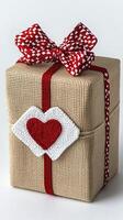 Rustic Burlap Gift Box with Red Bow and Felt Heart photo