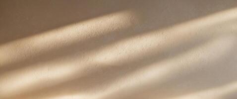 A wall with shadows from the sun photo
