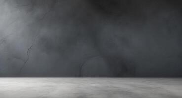 An empty room with a concrete wall and a concrete floor photo