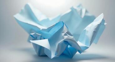 Blue crumpled paper creating a unique and irregular backdrop. photo