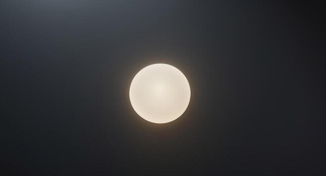 Light circle creates a mesmerizing illusion on a dark background in a creative visual art display. photo