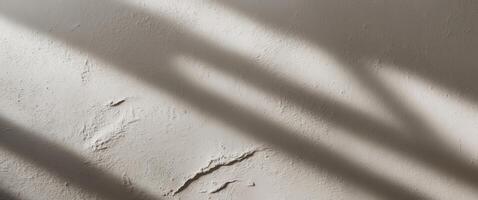 Venetian plaster showcases rough texture with side lighting and bright backdrop for depth. photo