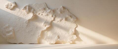 A wall with a large piece of white plaster photo