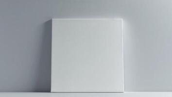 Blank white square on a grey background photo