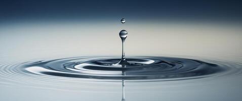 Water Droplet Impact with Circular Ripples and Gradient Background photo