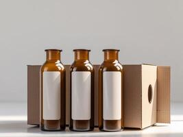 Three empty brown bottles sitting in a cardboard box photo