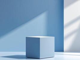 A blue cube sitting in front of a wall photo