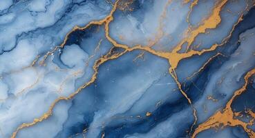 Blue and gold marble texture with intricate veining suitable for backgrounds and design projects. photo