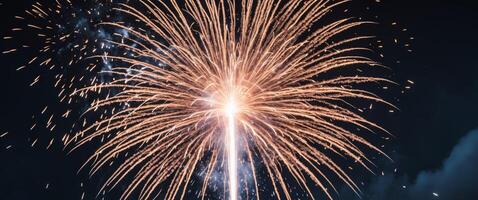 a close up of a firework on a black background photo