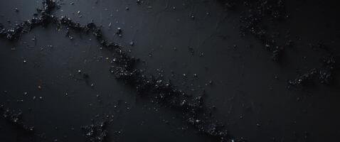 Abstract Black Texture with Shimmering Particles Creating a Moody Atmospheric Background for Creative Design photo