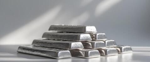 Silver bars on a white background photo