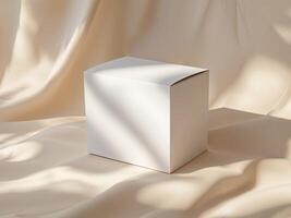 White mockup package box placed on soft beige background with natural light highlighting its clean design photo