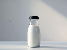 Clear Pixel Image of a Bottle of Milk with a Black Cap on it. photo