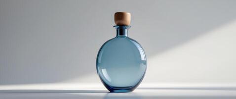 a close up of a blue flask with a wooden top photo