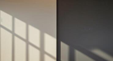 Light from window casting shadows on split toned wall photo