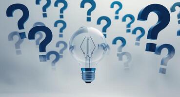 a light bulb surrounded by question marks symbolizing ideas and innovation photo