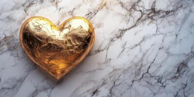 Golden heart displayed on a marble surface creates an elegant centerpiece for decor or events photo