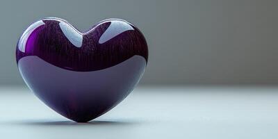 Purple glass heart sculpture on a neutral background, showcasing its glossy finish and unique shape photo