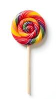 Colorful spiral lollipop on stick with bright hues and playful design at close range photo