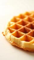 Extreme closeup of a golden waffle with a detailed texture and unique patterns photo