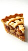 Closeup of a slice of pie with a golden crust and caramelized filling photo