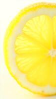 Closeup view of a fresh lemon slice showcasing its juicy texture and vivid color photo