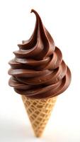 Chocolate soft serve ice cream in a crispy cone ready to enjoy on a sunny day photo