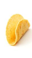 Closeup of a folded tortilla on a plain background with a natural texture photo