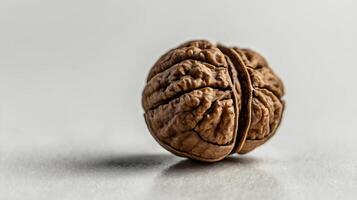 Extreme closeup of a walnut half showcasing its intricate texture and details photo