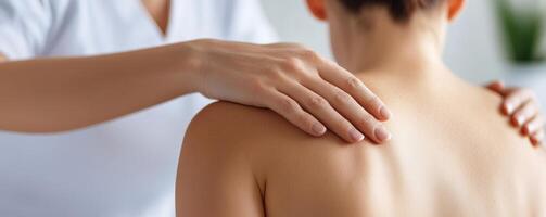 comfort empathy and compassion in touch and support concept. Relaxing massage therapy on a person's shoulder and back. photo