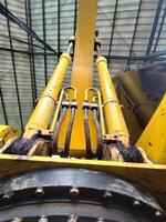 Close-Up of Excavator Engine Components and Hydraulic System photo