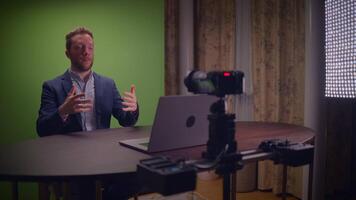 Expert Professional Presenter in a WellEquipped Studio Utilizing a Green Screen Setup for Visuals video