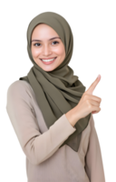 Charming muslim woman in hijab, pointing to a product with a warm and inviting smile png